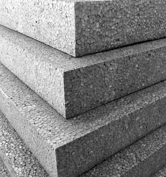 Stack of textured EPS foam insulation boards used for external wall insulation